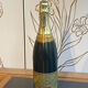 Bottle-shaped music cigarette dispenser