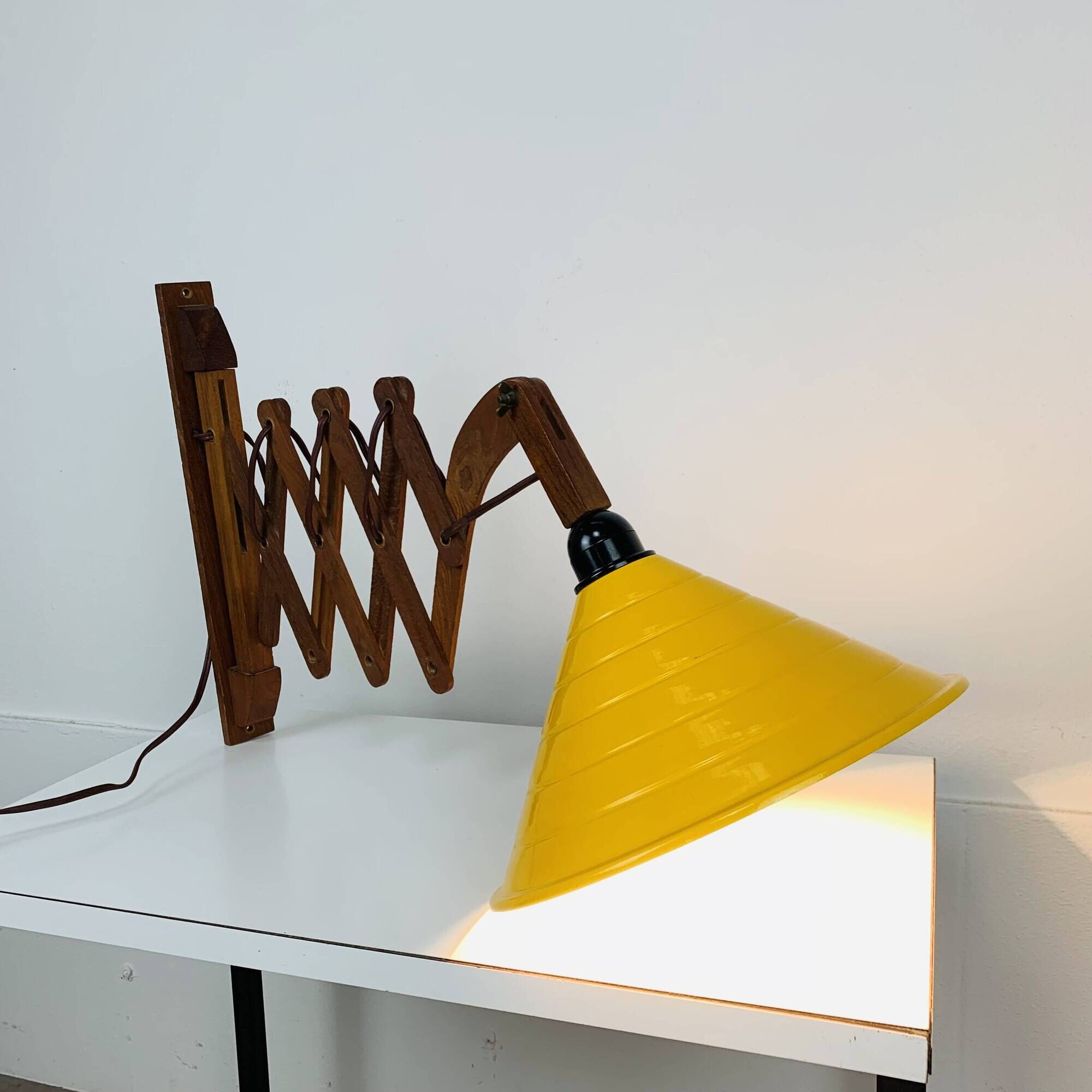 Scandinavian accordion wall light from the 60s, wood and yellow reflector