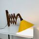 Scandinavian accordion wall light from the 60s, wood and yellow reflector