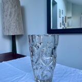 Molded glass vase with sculpted decoration