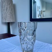 Molded glass vase with sculpted decoration