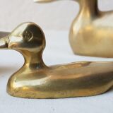 Trio of brass ducks