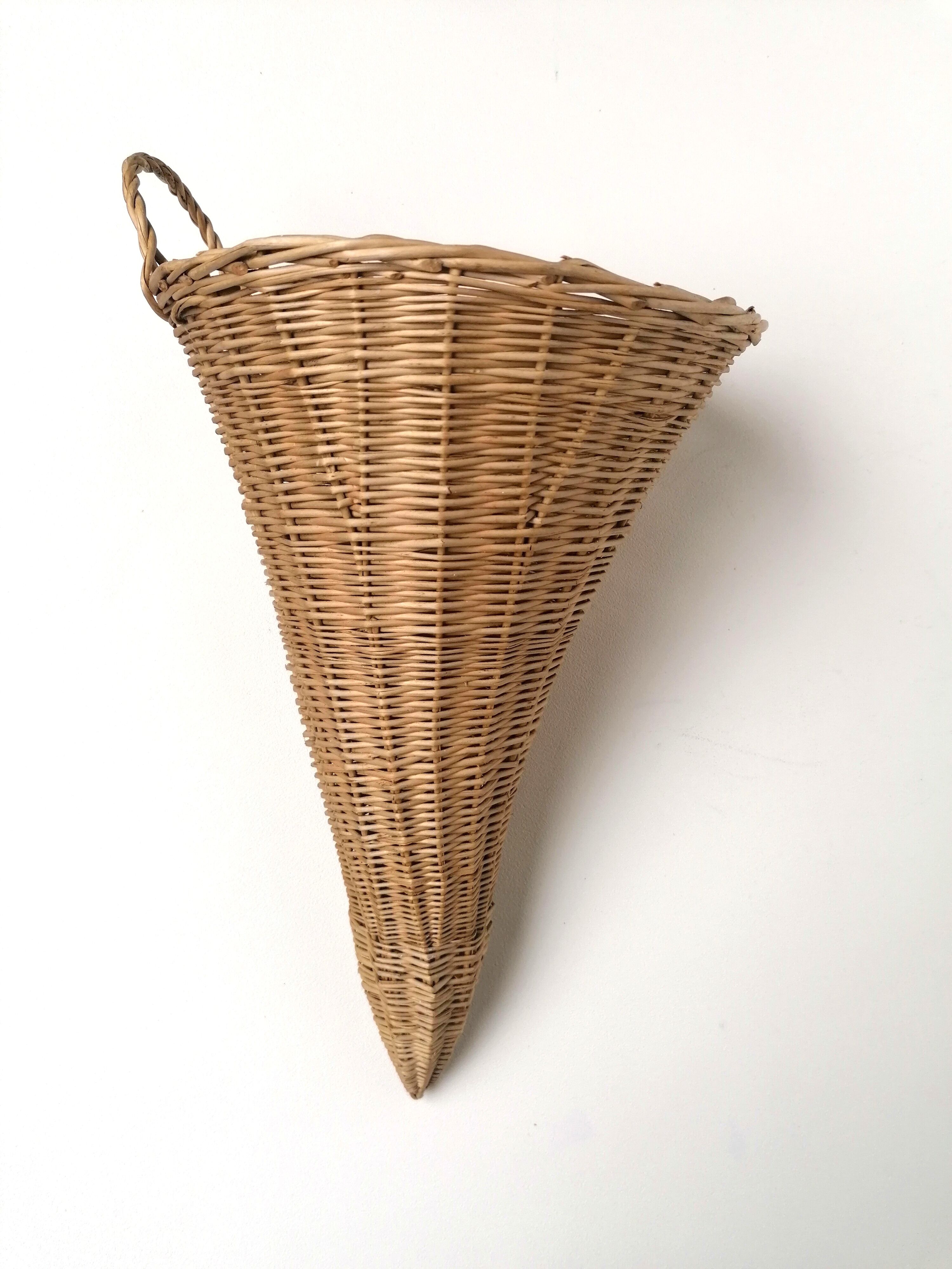 Wicker basket in cornucopia shape