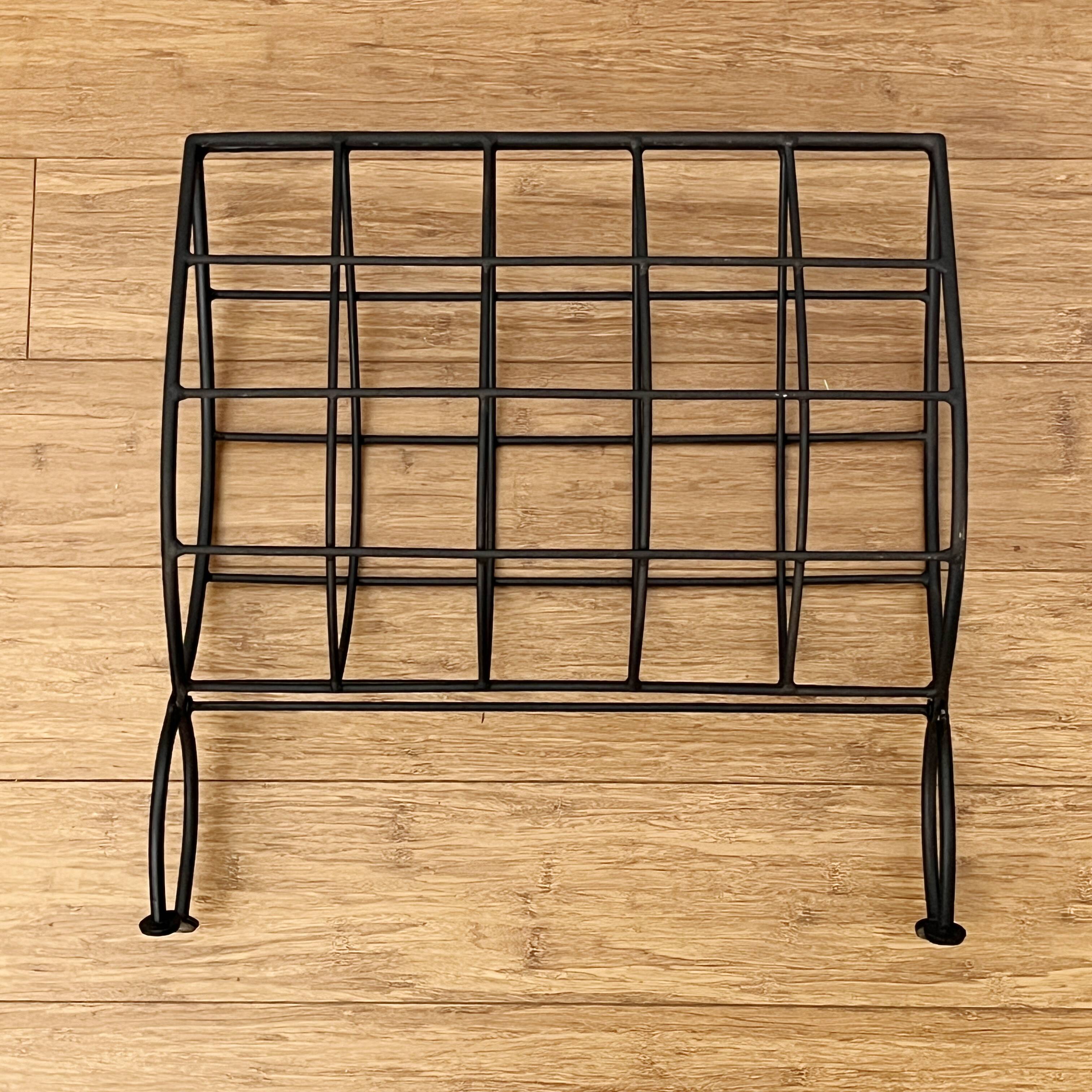 Black metal magazine rack