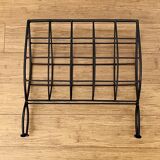 Black metal magazine rack