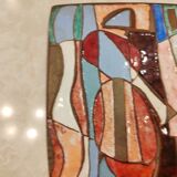 Isaac Lane Muse, brass and enamel plaque.