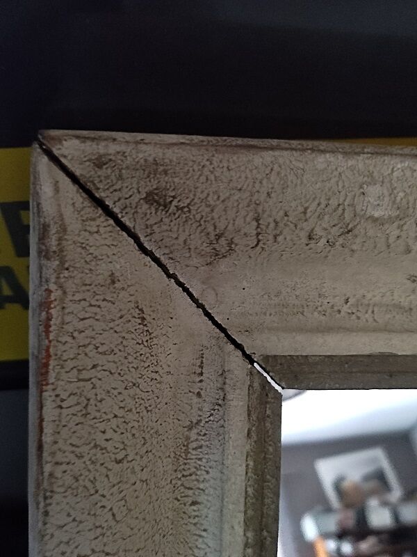 Mirror patinated wood frame gilded