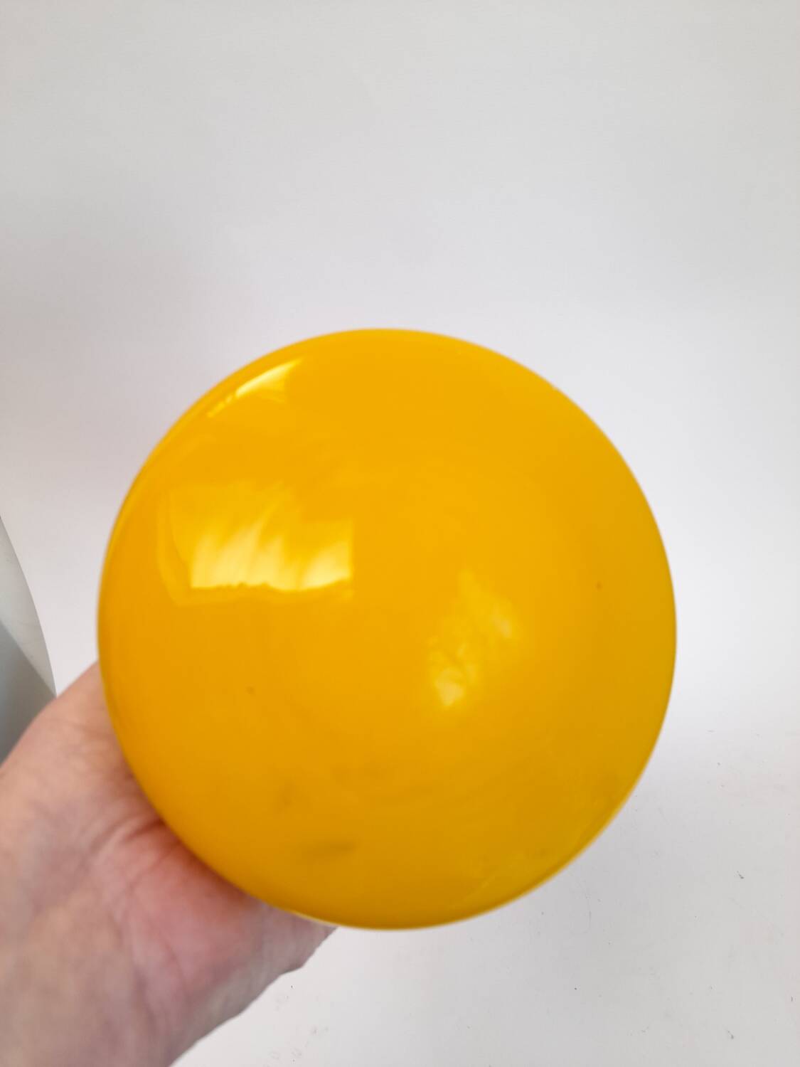 Wobble vase in yellow opaline artisanal glass