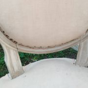 Antique armchair in Louis XVI style from the late 19th century.