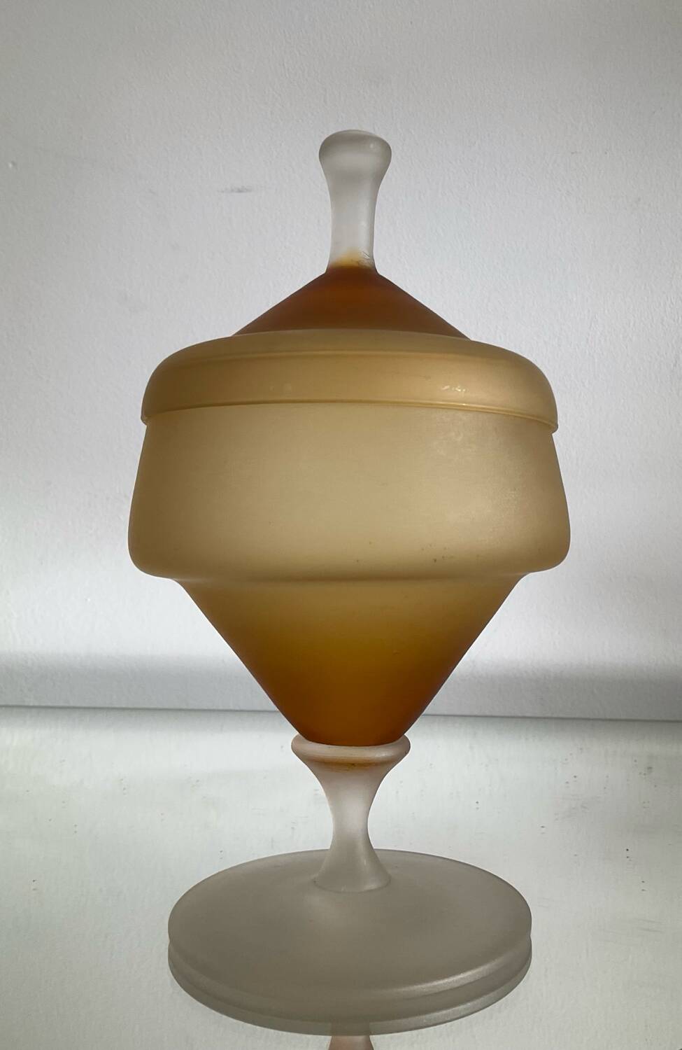 Vintage blown glass candy box on a stand