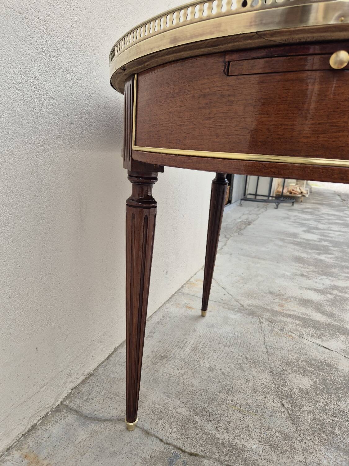 Louis XVI style mahogany bouillotte table in marquetry and bronze