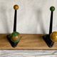 Coat rack with 5 double metal hooks and vintage wooden balls from the 1950s.