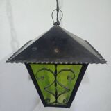 Wrought iron and green glass lantern