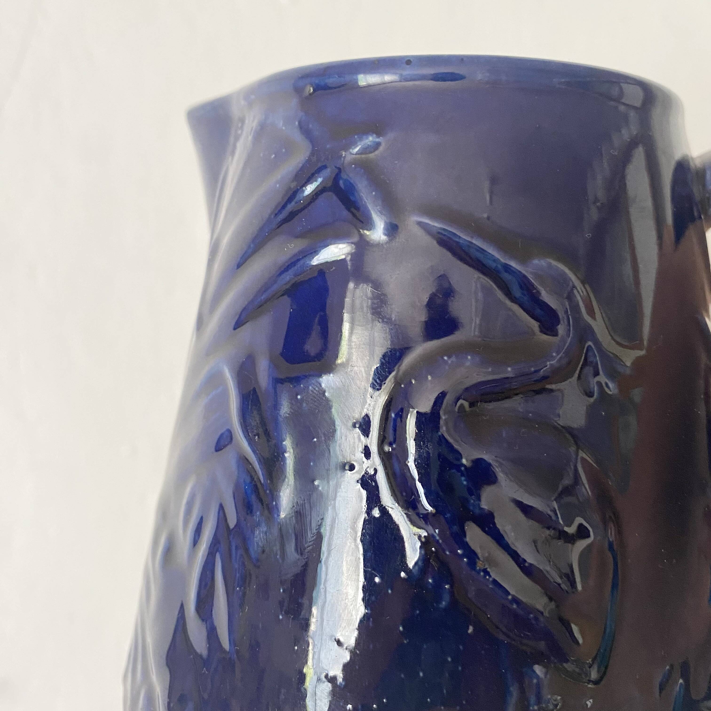 Heron slip jug made in England