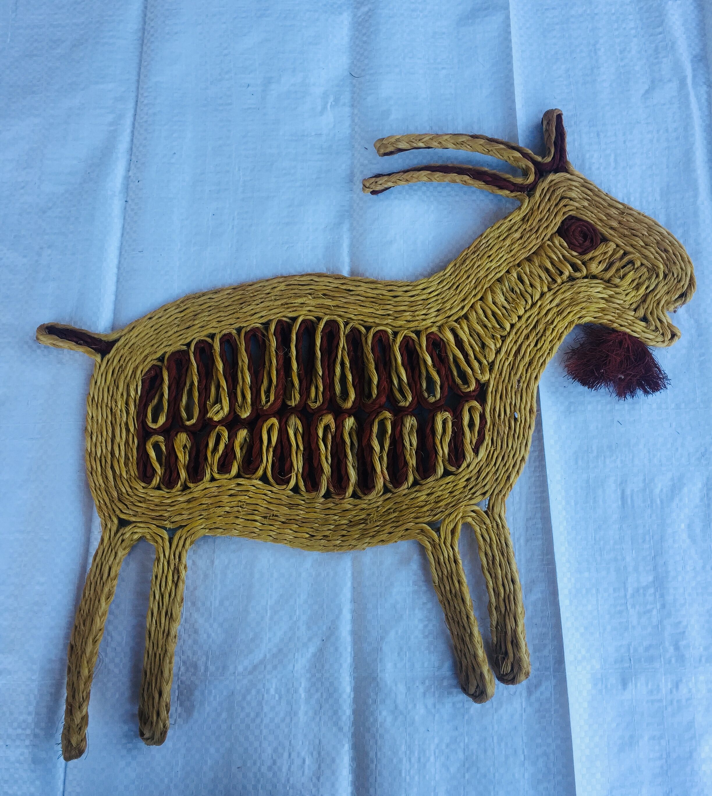 Trio of vintage rope animals table mats