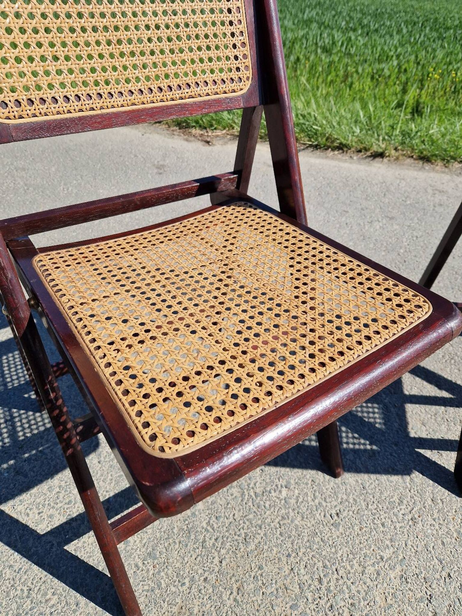 Lot de 2 chaises pliantes en bois et cannage