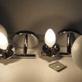 Pair of sconces with an opaline globe and chrome structure from the 1970s