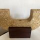 Brutalist XXL candle holder in stone and wood from the 1970s.
