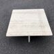 Square bass table in travertine