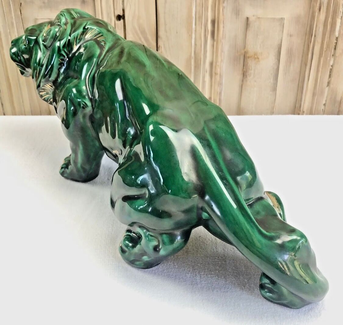 Art Deco lion statue cracked St Clement