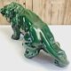 Art Deco lion statue cracked St Clement