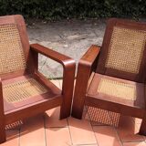 Pair of armchairs in rosewood and canework 1950