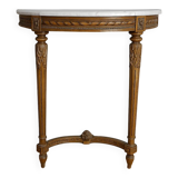 Half-moon console in Louis XVI style made of carved wood.