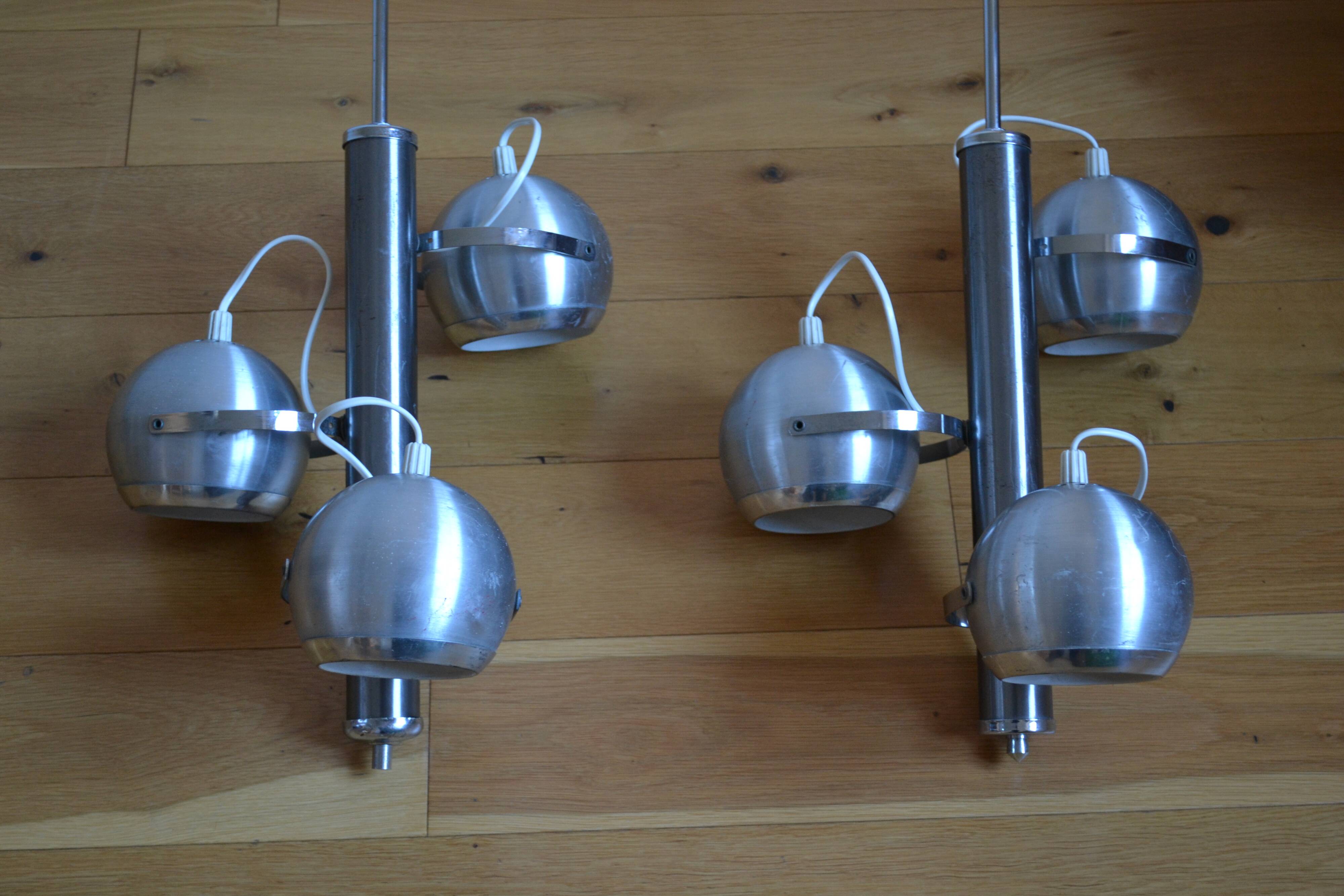 Pair of 70s space age eye ball chandeliers in brushed aluminum