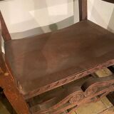 Paire fauteuils colonials cuir et bois sculpté