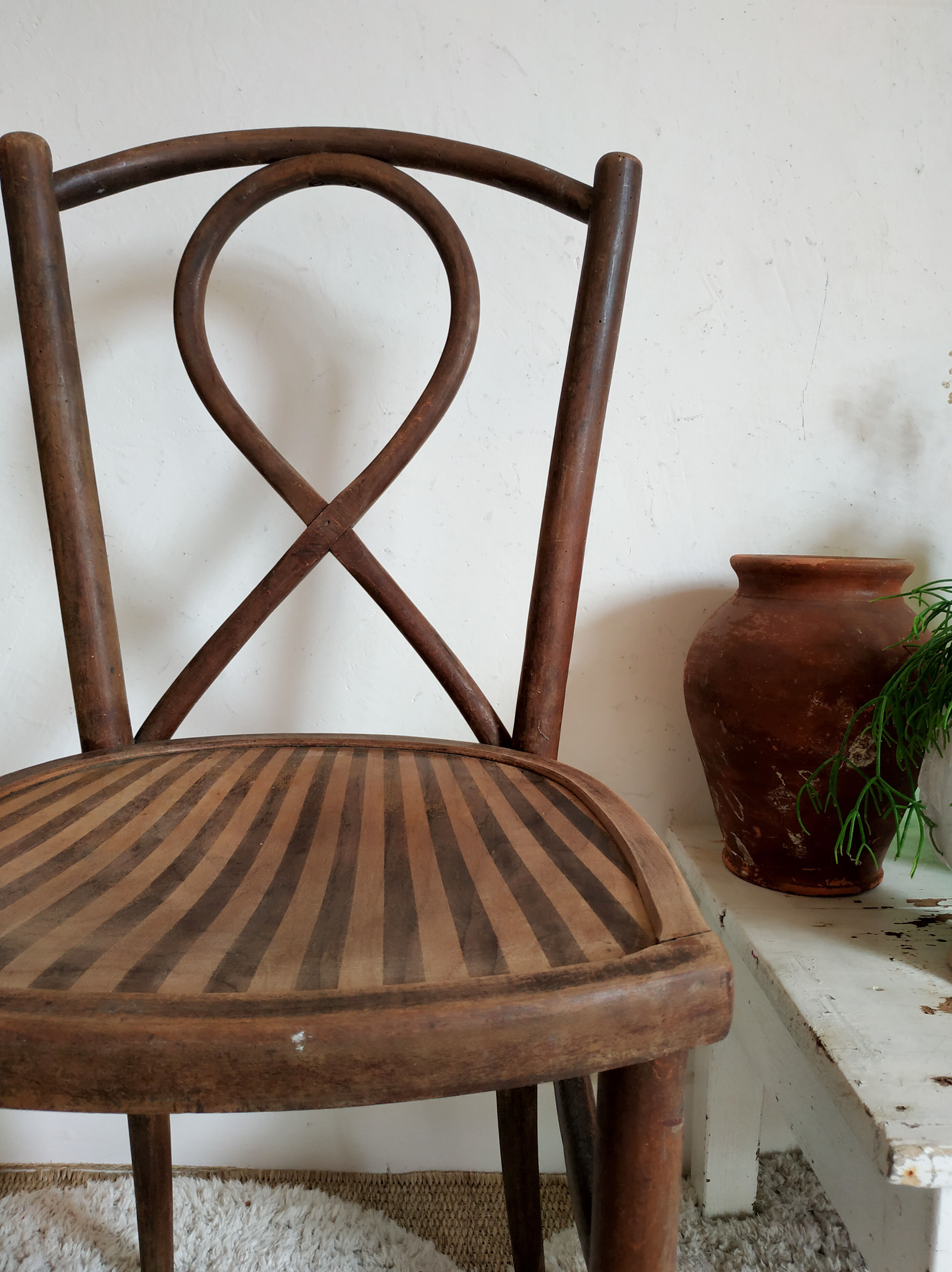 Striped curved wooden bistro chair
