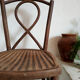 Striped curved wooden bistro chair