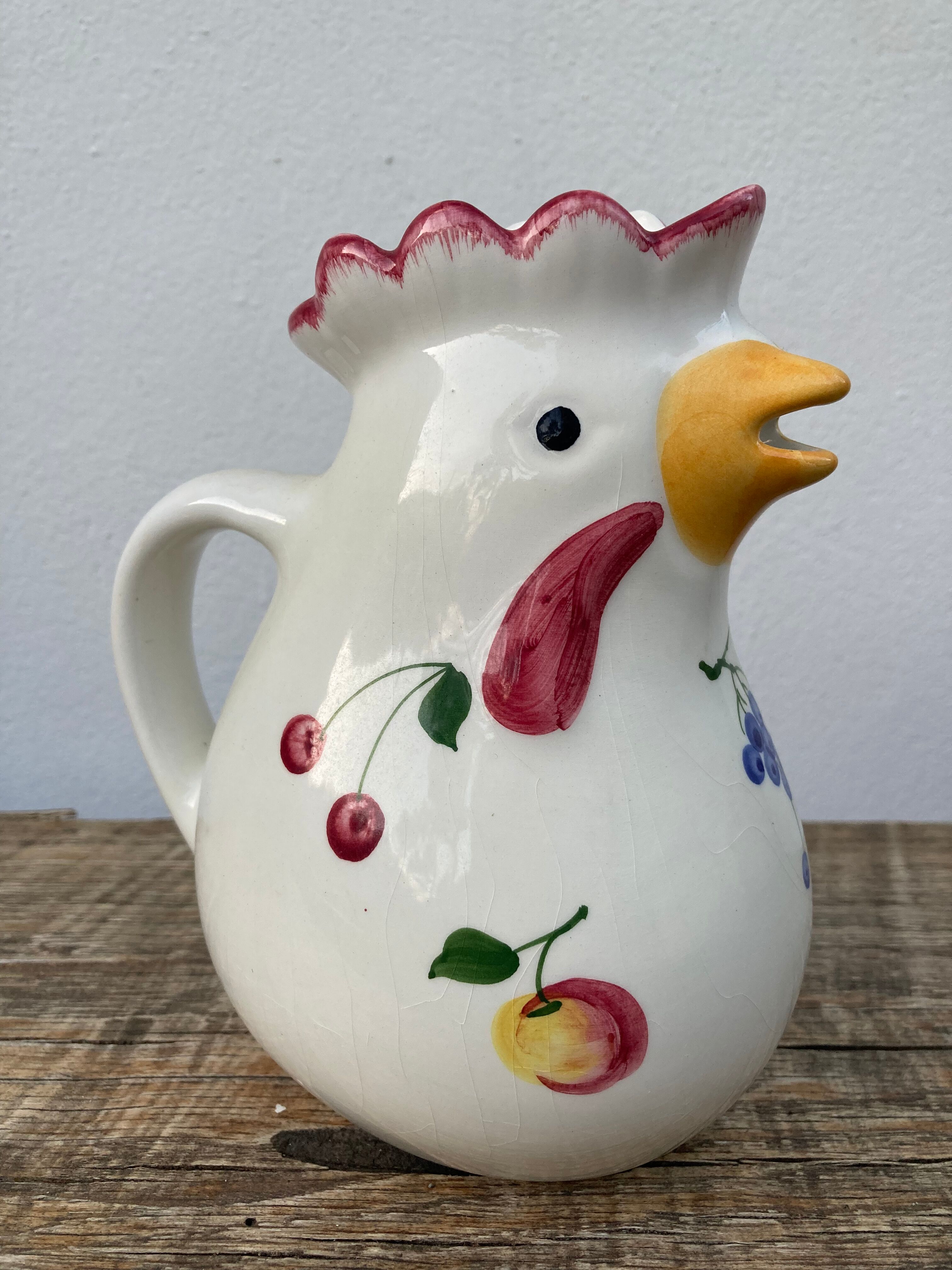 Ceramic rooster pitcher decorated with vintage flowers