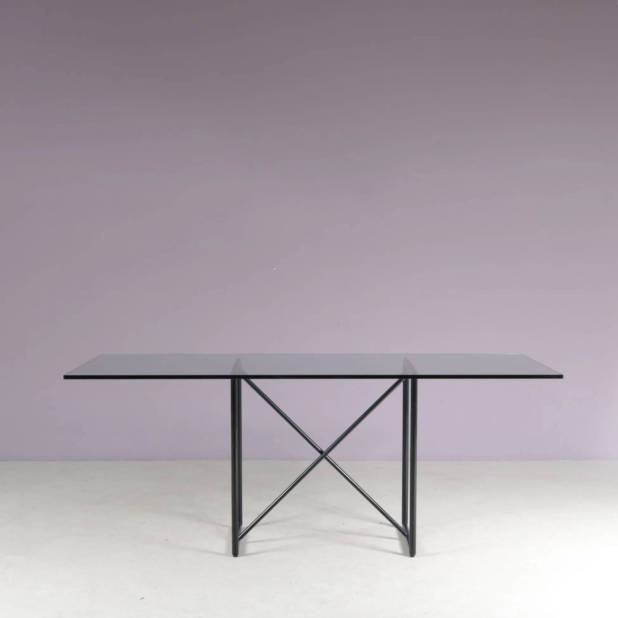 1980s “Tokio” dining table with six “Vienna” chairs by Rodney Kinsman for Bieffeplast, Italy