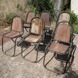 Set of 6 indu chairs in metal and exotic wood.