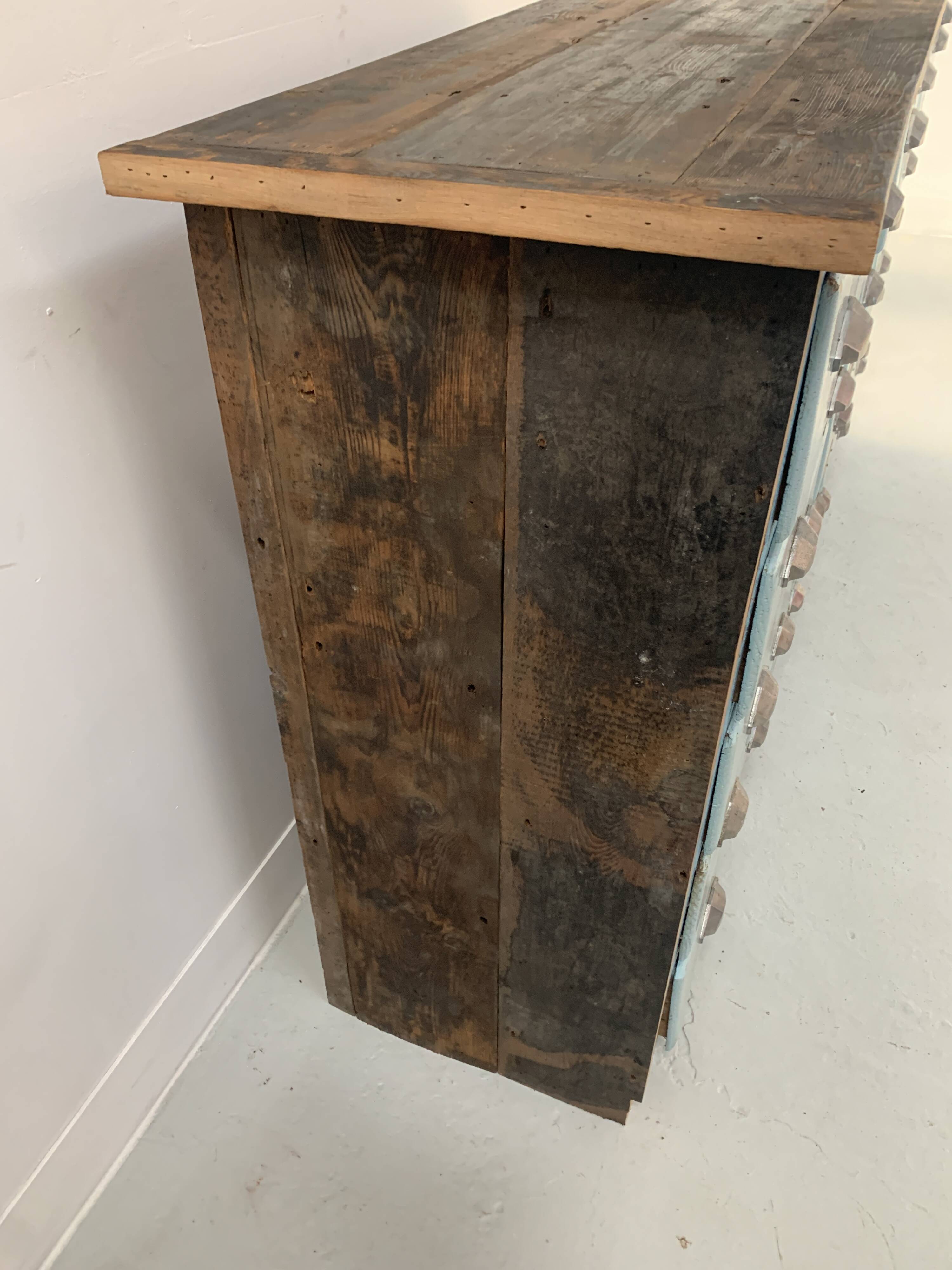 30-drawer storage unit in patinated fir, 20th century