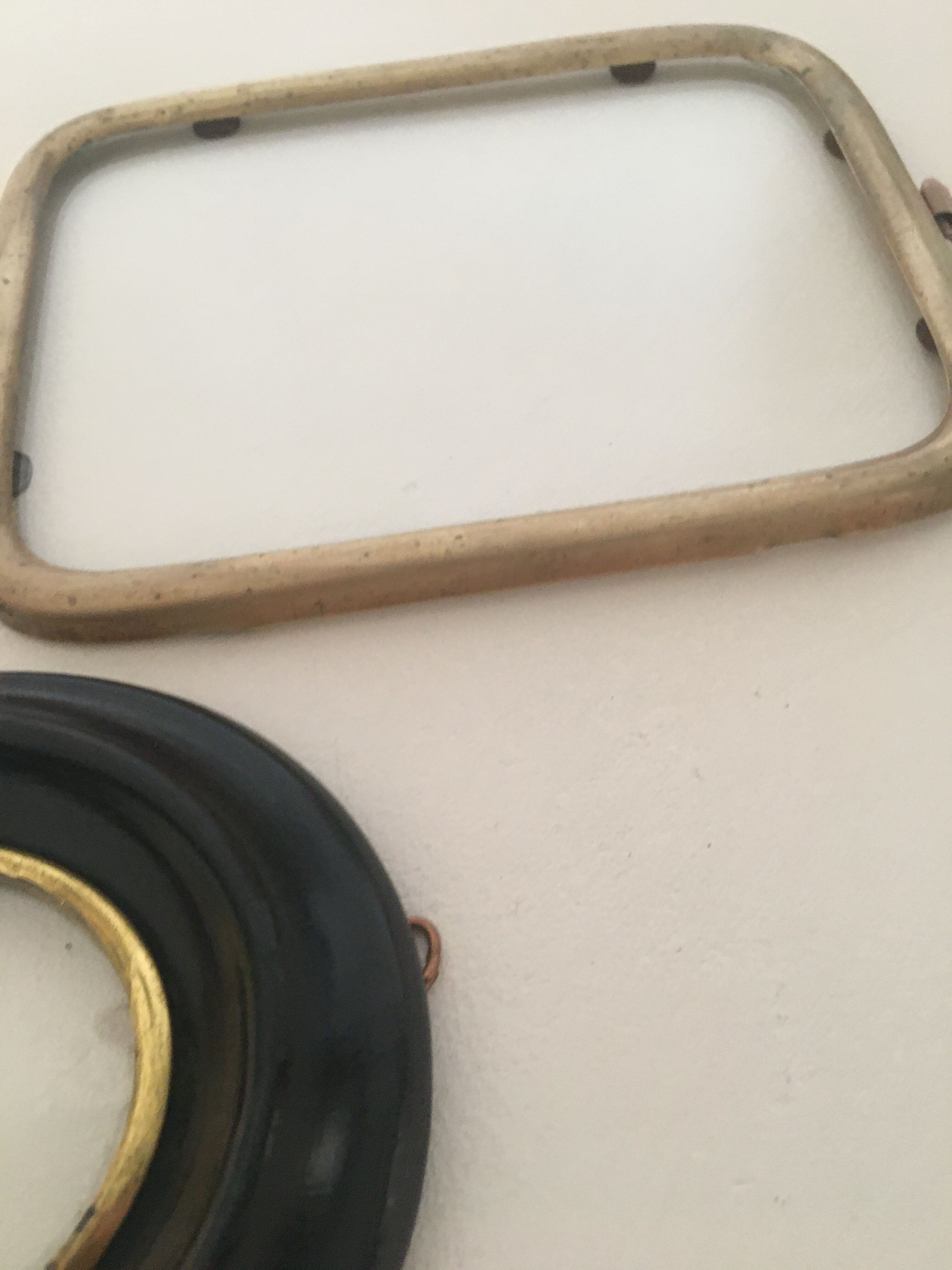 Set of wooden and brass frames with windows