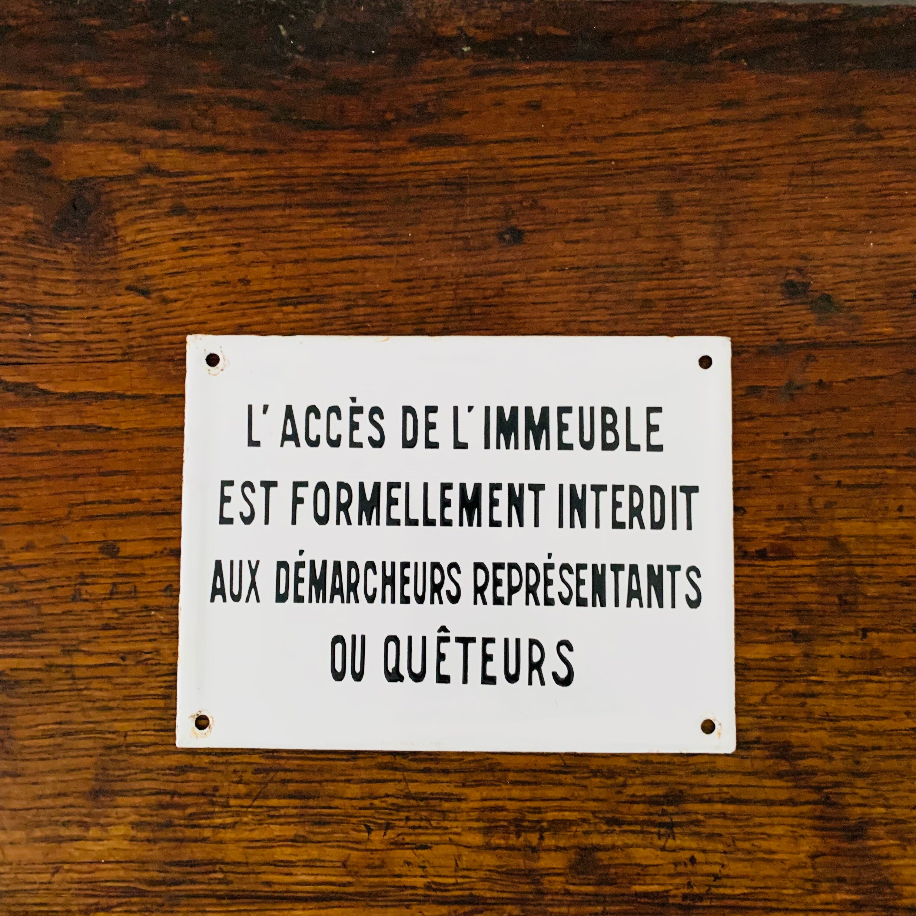 Old enamelled plaque of building