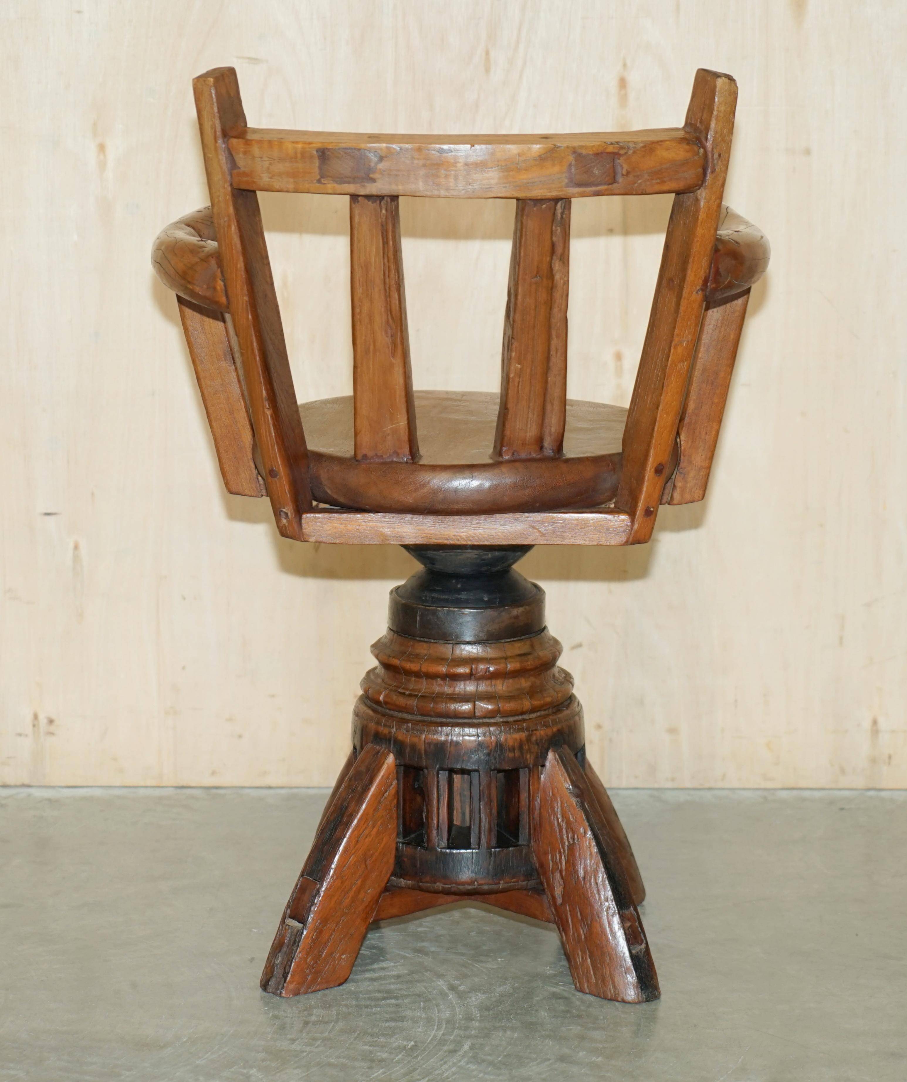 Antique captain's swivel chair on a draft horse wheel from around 1760.
