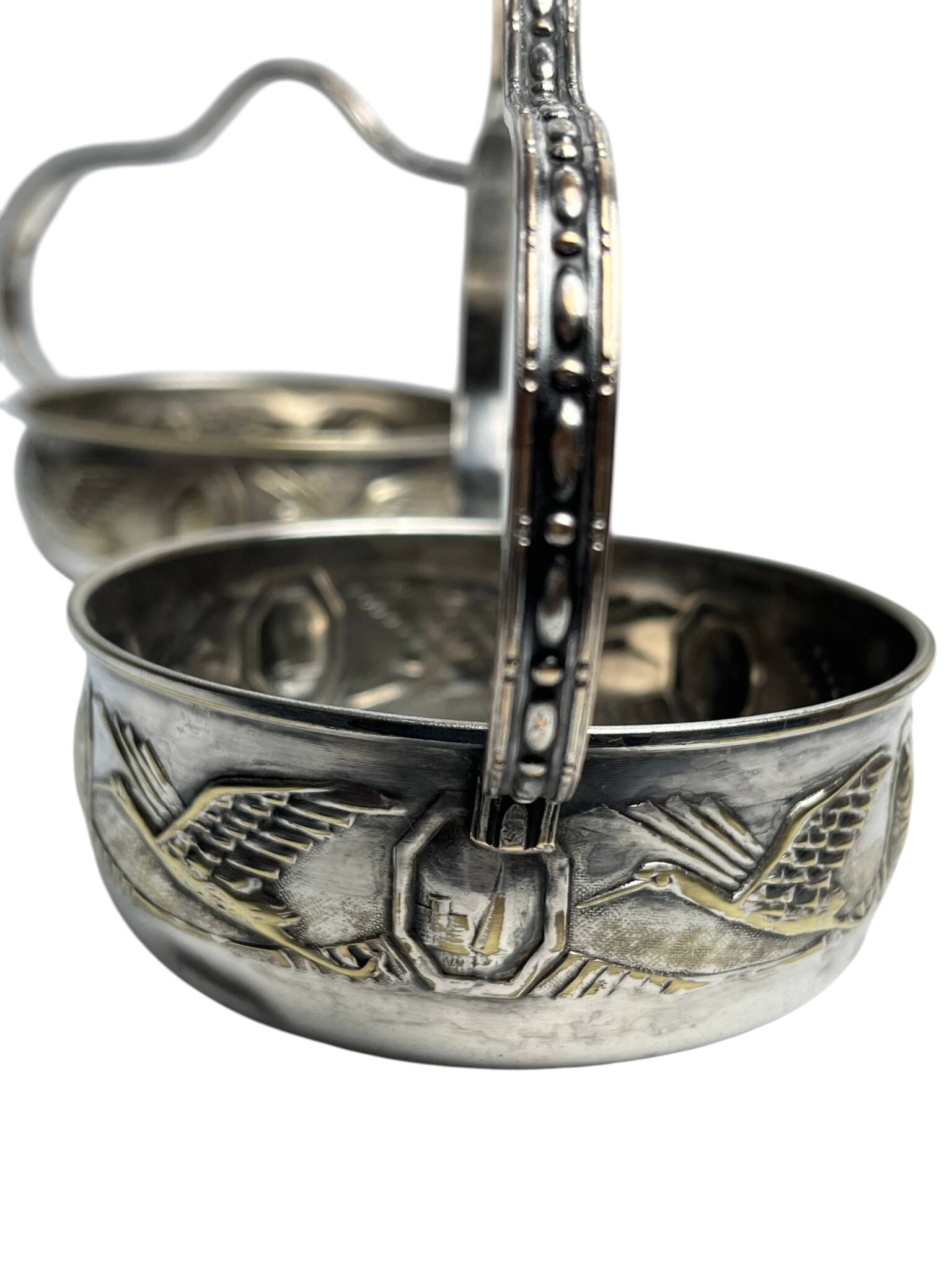Art Deco pair of basket-shaped bowls with handles, silver-plated, circa 1940.