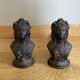 Pair of cast iron andirons from the 19th century, busts of women