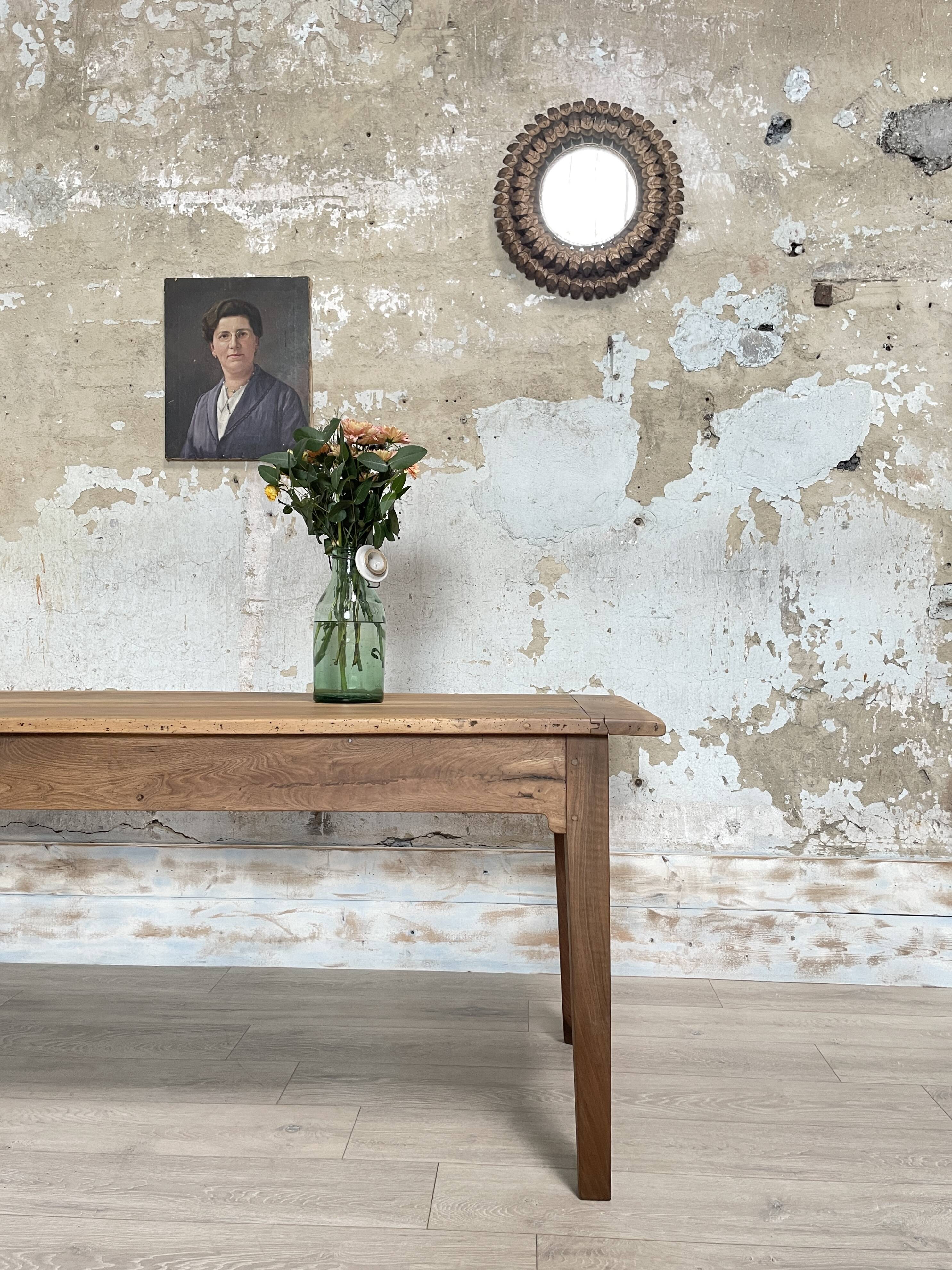 Vintage farmhouse table with spindle legs.