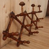 Turned wood wall coat rack