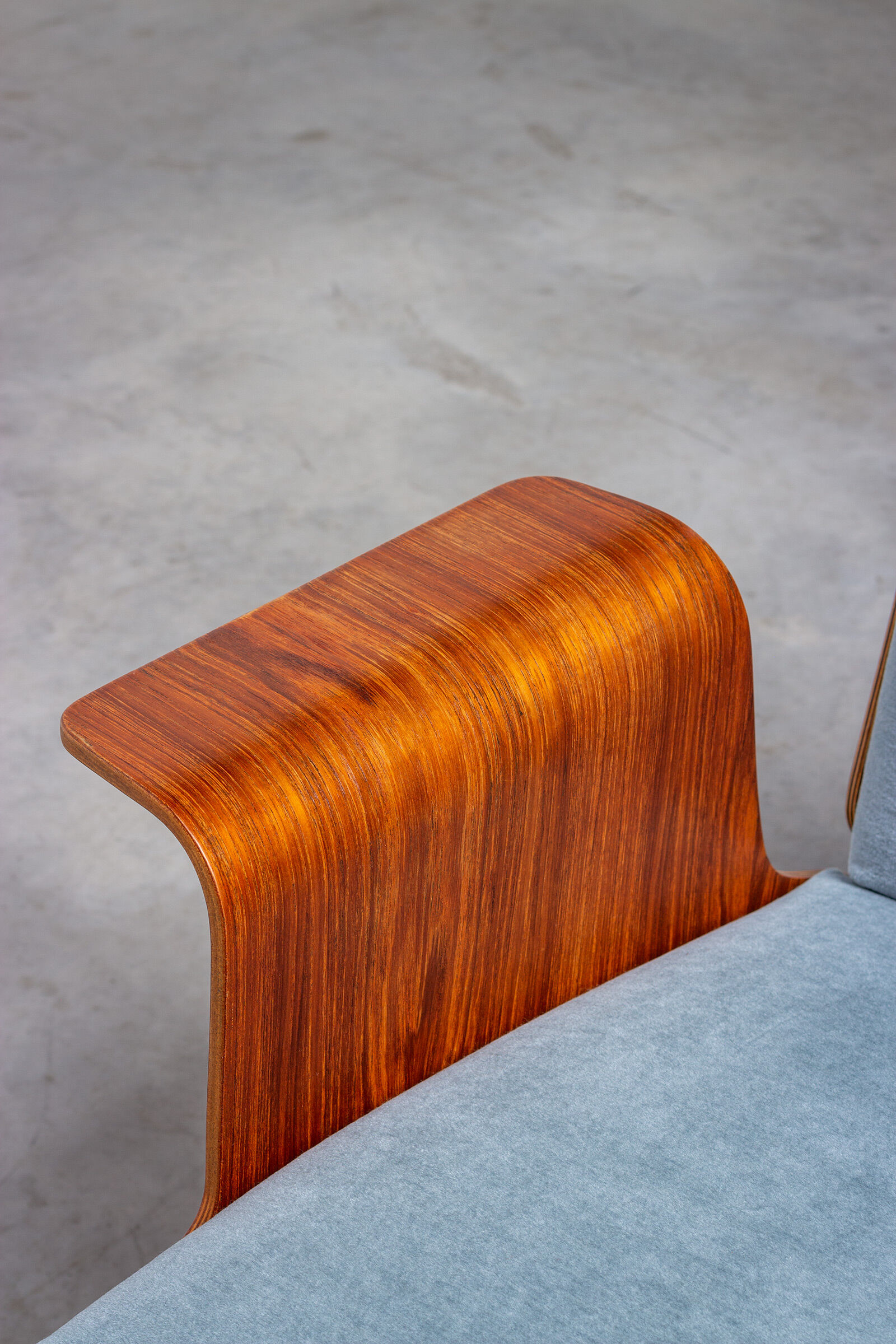 Pair of modernist teak lounge chairs and poufs 1960