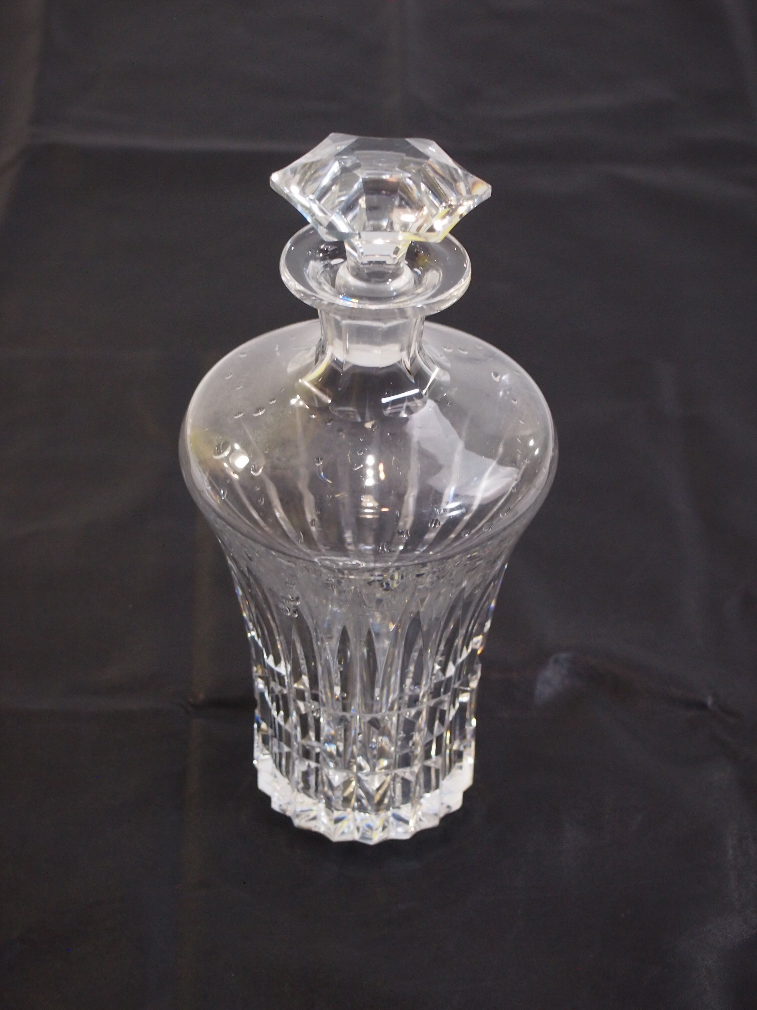 Ancient carafe with its cut crystal bouchon