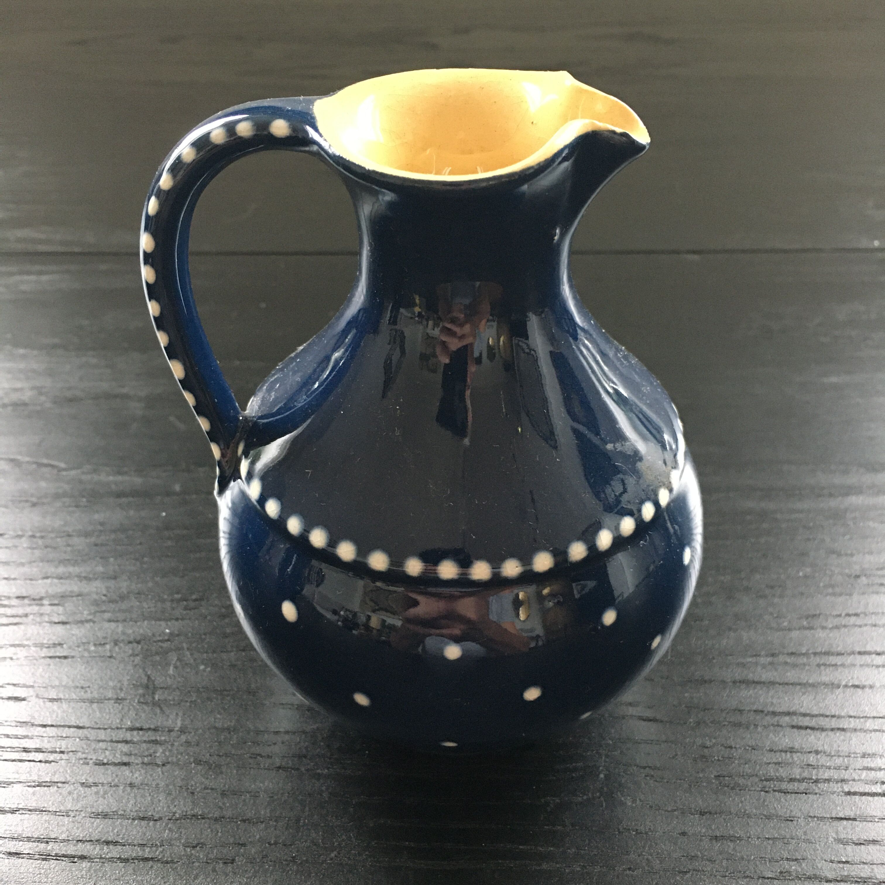 Midnight blue pitcher décor white polka dots