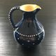 Midnight blue pitcher décor white polka dots