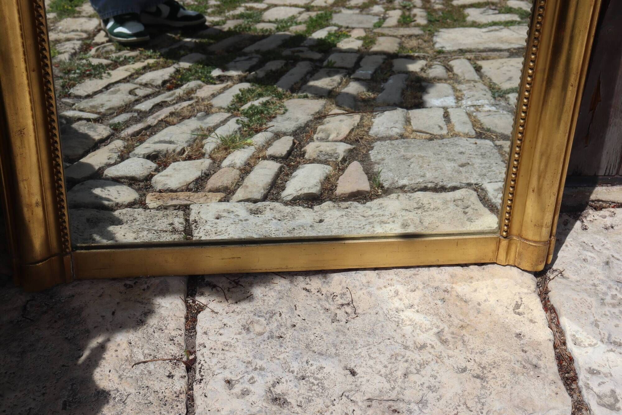 Large gold mirror in Louis XV style