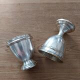 Antique egg cups on silver-plated metal stand