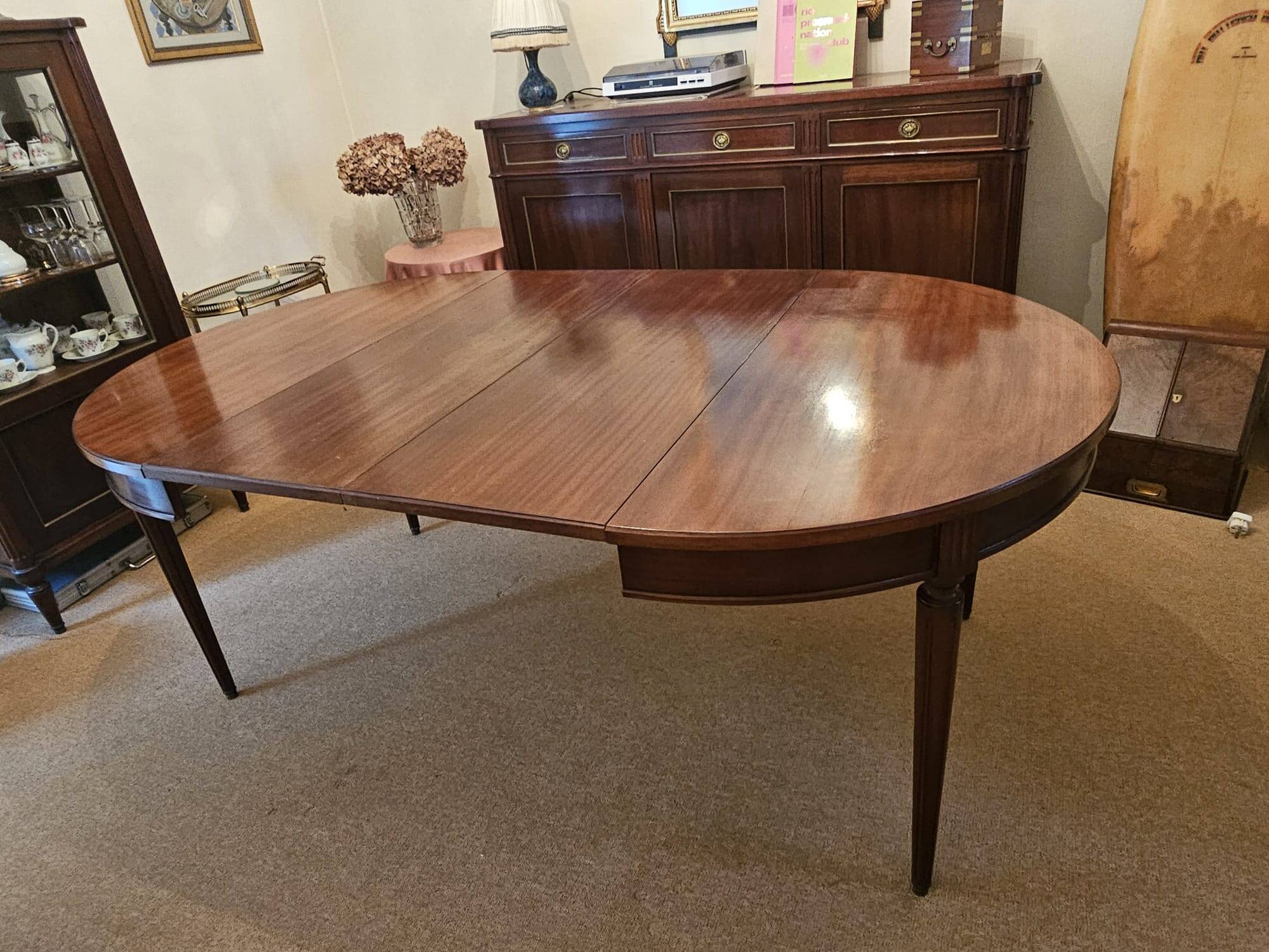 Extendable dining table, Louis XVI style in solid sapele