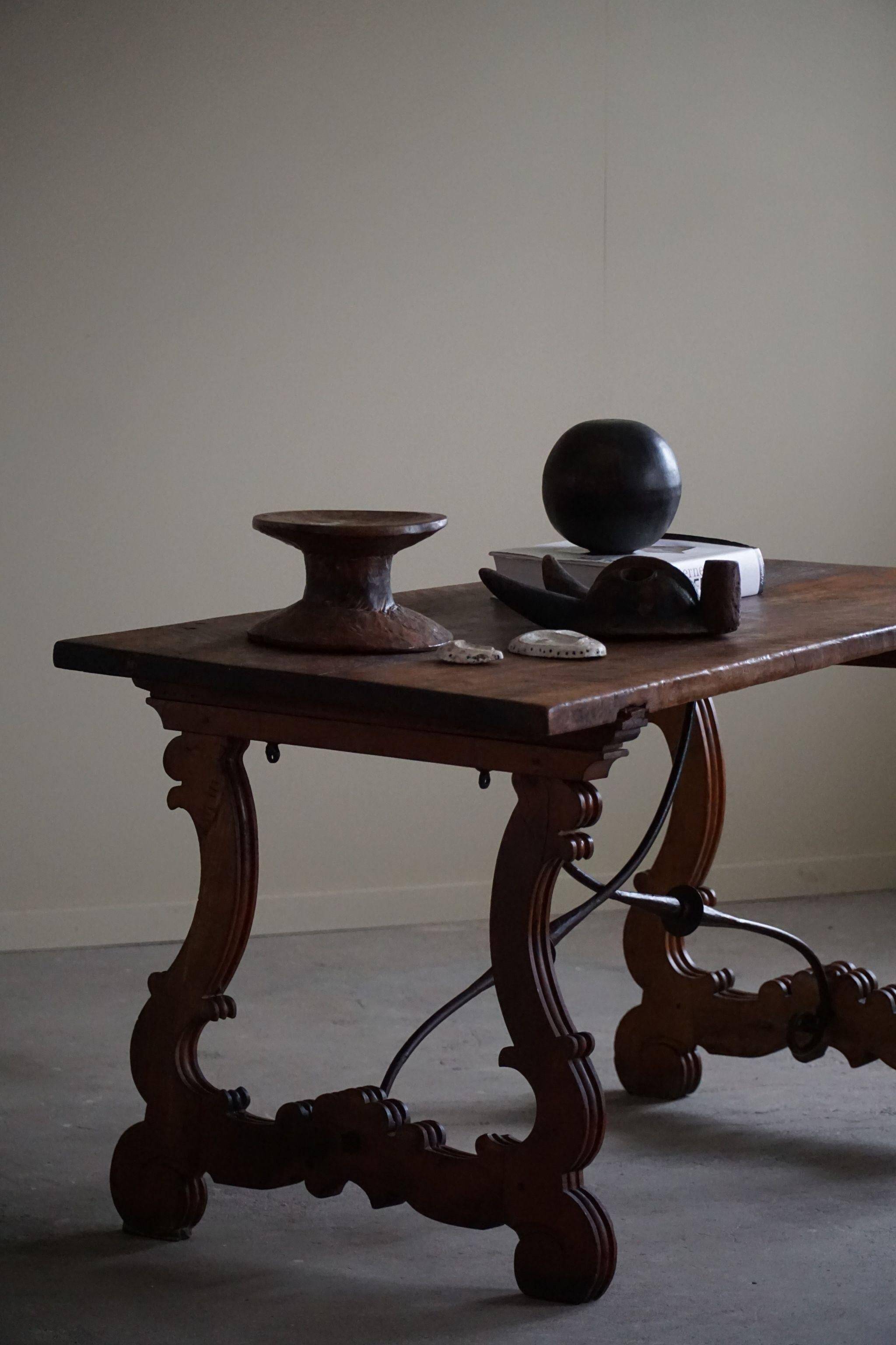 Brutalist table in antique Spanish solid oak and wrought iron, 19th century.